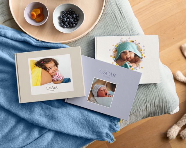 Personlige babyfotobøger med babybilleder på omslagene.
