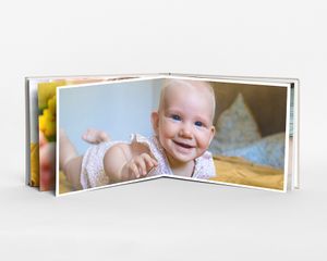 Layflat liggende L fotobog med hårdt omslag